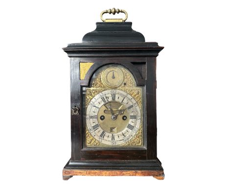 18th Century ebony veneered bracket clock. The arched brass dial with 'Strike/Silent' dial to the arch, matted centre with da