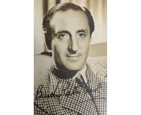 Basil Rathbone (1892-1967) – A framed black and white photograph signed by Basil Rathbone in black ink “Basil Rathbone”. Blac