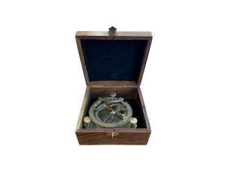 Nautical West brass compass sundial in wooden box. 