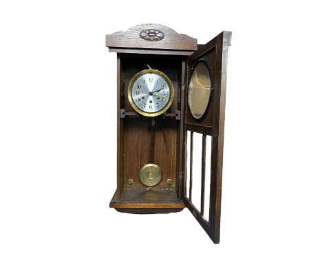 Mahogany cased wall clock with plague "Presented to Ex-P.C. Wilfred Wood by the members of The Leamington Borough Police Forc