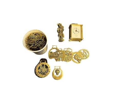 Brass Carriage Clock and Brassware. A Lionel Peck brass battery powered carriage clock (untested), with 33 various horse bras