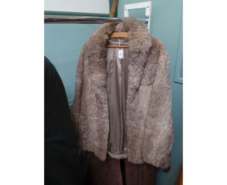 Half length lined ladies light brown fur coat