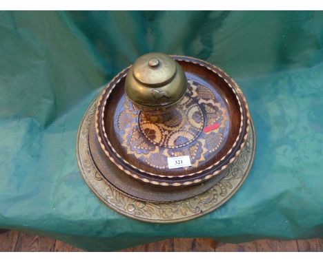 Circular brass embossed tray, decorative wooden trays and and a Liptons brass tea caddy