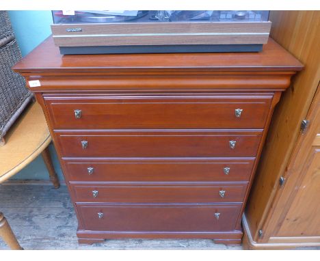 Mahogany Olympus chest, freeze drawer and five long drawers each fitted small brass handles, all on bracket feet
