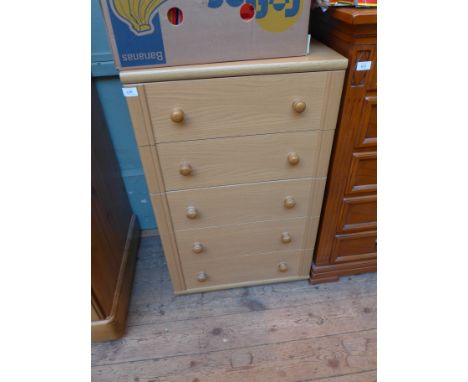 Neat nest of five graduated drawers each with turned bobbin handles