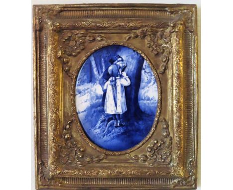 19th century English Delft style gilded edged blue and white oval ceramic panel, within a gilded frame. Panel Approx. 18 x 23