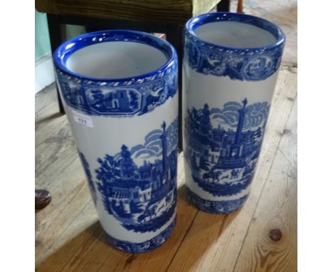 A pair of blue and and white reproduction ceramic stick stands (44cm).