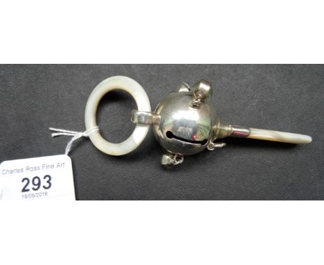 An early 20th century silver and mother of pearl baby's rattle, with attached teething ring, Birmingham hallmarks 1922 (9.5cm