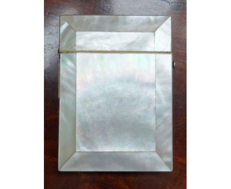 A 19th century hinged lidded mother of pearl covered card case (10.8cm x 7.7cm).