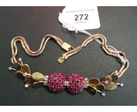 A ruby and diamond collar necklace, the centre set with two bombé ruby clusters, articulated on a four stone baguette diamond