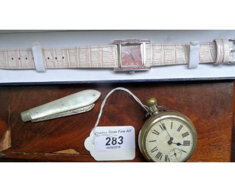 A lady's pink sapphire mounted wristwatch, having pink toned mother of pearl dial, together with a pocket watch and a mother 