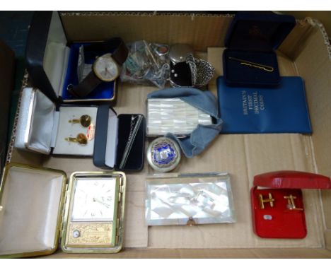 A mixed lot to include: tie pins, cufflinks, a wristwatch, travelling clock, a Continental religious themed book in mother of