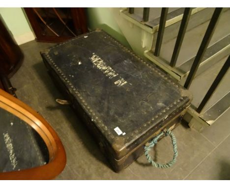 A large steamer trunk, to include a large quantity of woodworking tools, tins, model railway rolling stock and other items.