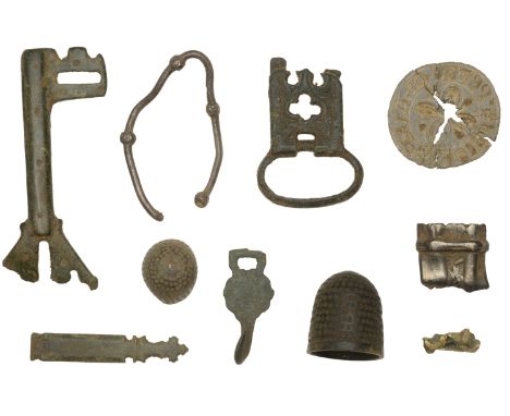 Medieval, various artefacts (10), including a lead seal matrix, thimbles (2), a buckle, annular brooch, key, dress hook, dagg