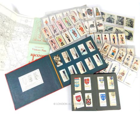 A large collection of period cigarette cards by Will's, John Player and Sons and Churchman's (two complete albums and a quant