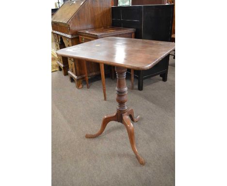 A 19th Century mahogany wine table with square top, turned column and tripod base