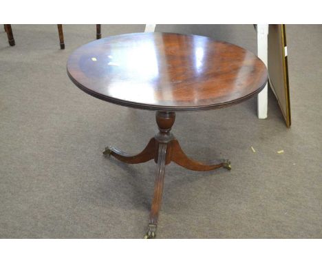 A Georgian Revival mahogany lamp or coffee table with circular top, turned column and a tripod base, top 65cm diameter