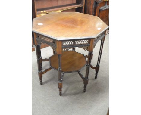 A Victorian mahogany aesthetic style octagonal centre table in the style of E Godwin with pierced freize, eight turned three 