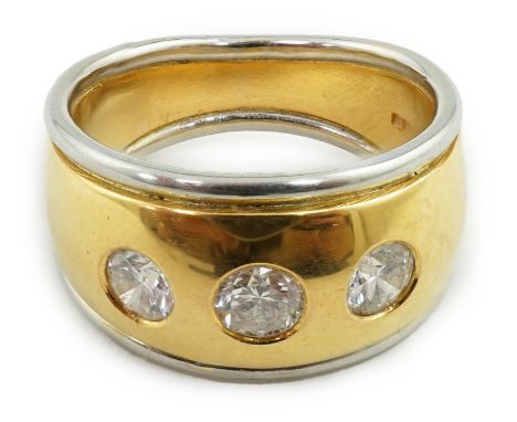 A 22ct gold and platinum gypsy set three stone diamond ring, the brilliant cut stones approx. 0.86ct total weight, hallmarked