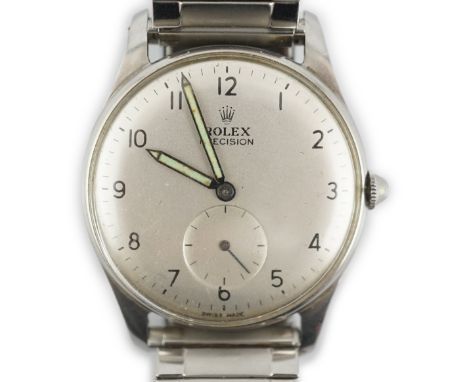 A gentleman's 1950's stainless steel Rolex Precision manual wind wrist watch, with Arabic dial and subsidiary seconds, case b