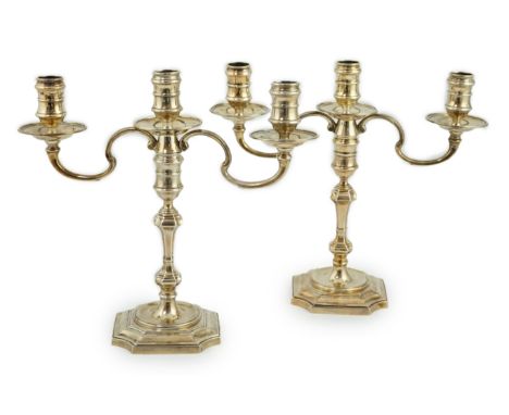 A pair of Queen Elizabeth II silver two branch, three light candelabra, by J.B. Chatterley &amp; Sons Ltd, with scroll arms a