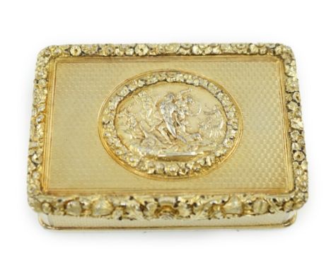 A late George III engine turned silver gilt rectangular snuff box, by William Snooke Hall, the cover with central oval classi