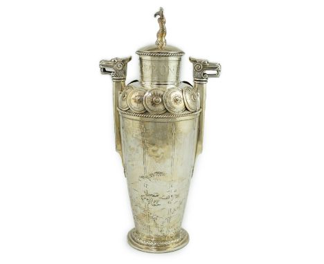 A good American sterling silver cocktail shaker, decorated with Viking inspired motifs and named 'Capronia' to the rim, with 