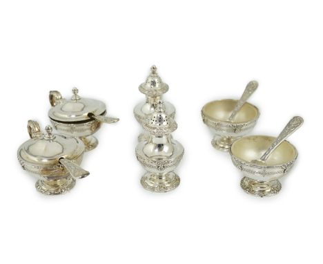 An Elizabeth II cased silver six piece pedestal condiment set, with four matching spoons, by Garrard &amp; Co, London, 1956, 