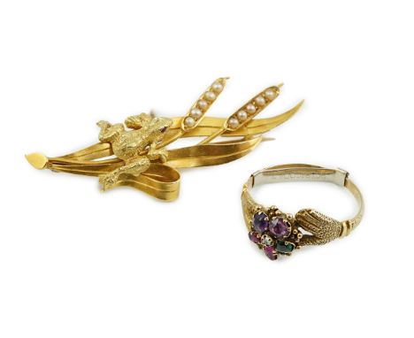 A late Victorian 15ct gold 'Regard' ring, modelled as two hands clutching a flower head, size K, together with a 15ct gold an