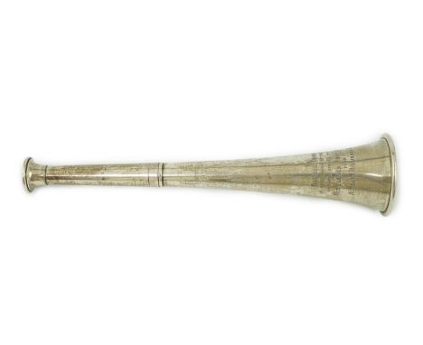 A George V silver hunting horn, with engraved inscription, indistinct maker's mark, London, 1915, 22.7cm, 123 grams.**conditi