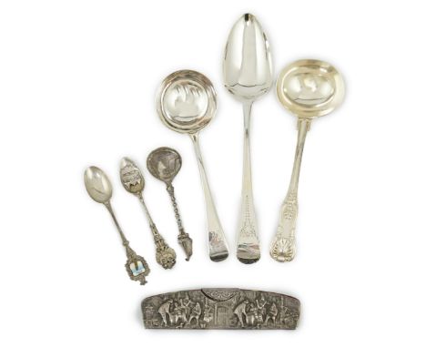 A collection of assorted 18th century and later silver flatware, including table spoons, teaspoons, sauce ladles, sifter spoo