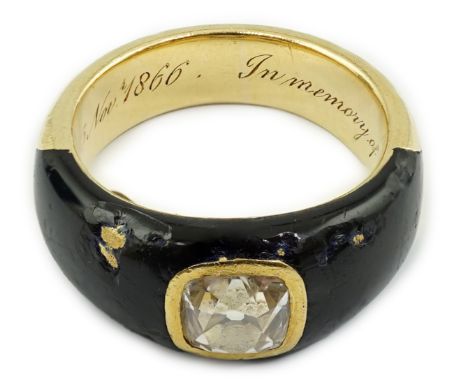 A Victorian gold, black enamel and old mine cut solitaire diamond set mourning ring, the stone measuring approximately 6.8mm 
