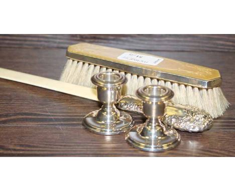 EMBOSSED SILVER IVORY PAGE TURNER
together with a gullioche enamel clothes brush and a pair of small dwarf candlesticks, 26cm