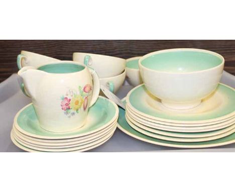 SUSIE COOPER FLORAL TEA SET
with beige ground with graded teal, floral transfer prints, five cups, saucers, side plates and a