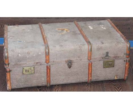 EARLY 20TH CENTURY CANVAS AND WOOD BOUND STEAM TRUNK
with four wooden ribs, with LMS and Anchor Line labels, 93cm long
