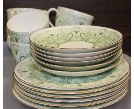 ROYAL DOULTON ARTS AND CRAFTS STYLE TEA SET
with six cups, saucers and side plates, in green scrolling foliate design with gr