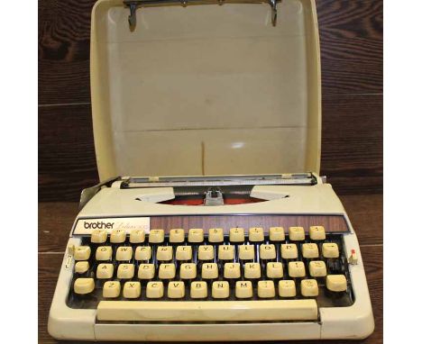 TWO VINTAGE TYPE WRITERS 
