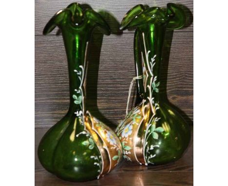 PAIR OF FRENCH ART NOUVEAU ENAMELLED GREEN GLASS VASES
enamelled with floral designs, 25cm high, some losses to enamel, but o
