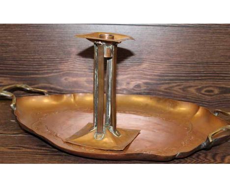 ARTS AND CRAFTS BEATEN COPPER CANDLESTICK
with square holder and base mounted with four bars; together with an embossed tray 