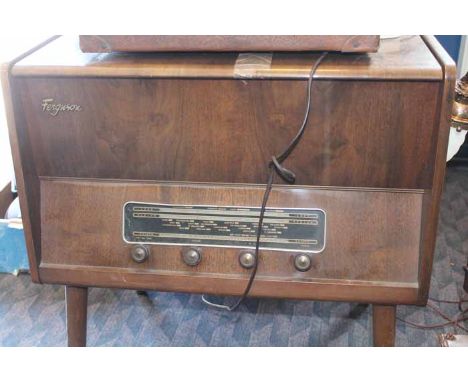 VINTAGE 'FERGUSON' LOUNGE WIRELESS
with record turn table above the wireless, in walnut veneer with post-modern design and fo