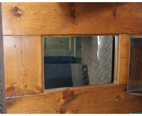 MODERN OAK MOUNTED MIRROR
70cm long, 65cm wide; together with an early 20th century Arts & Crafts book trough, 33cm long
