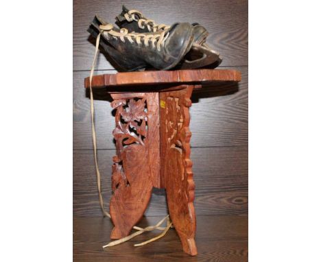 VINTAGE ICE SKATES 
and a carved octagonal table