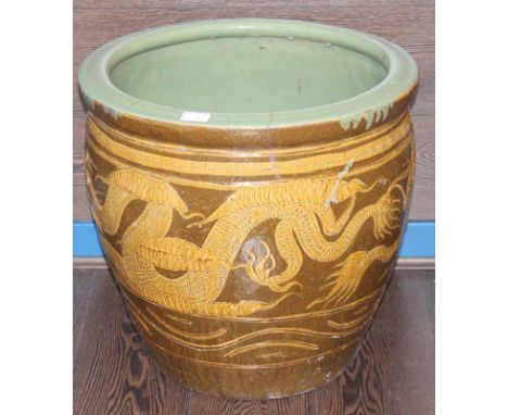 LARGE CHINESE STONEWARE PLANTER
with dragon chasing the flaming pearl
50.5cm diameter