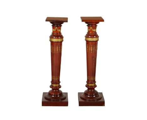 Pair of modern wooden French Empire style plinths or pedestals mounted with fine ormolu gilt bronze.Height: 41 1/2 in x width