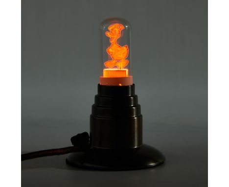 Aerolux, United States. Die-cut metal filament lightbulb in the form of Disney's Donald Duck, ca. 1930s. The bulb rests withi