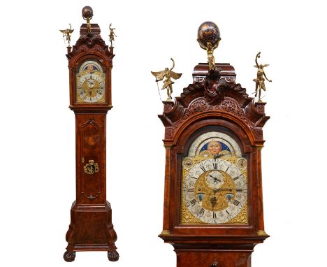 Dutch musical tall case clock, 18th c., Johannes Van Wyk, Amsterdam. The brass dial is engraved with a profusion of scrolling