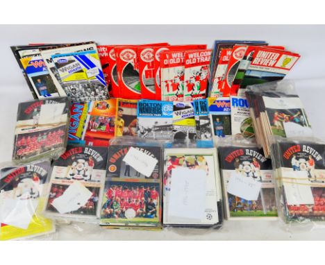 A collection of football programmes, predominantly Manchester United, 1960's and later. [W]

Condition Report: No old ticket 