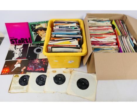 A large quantity of 7" vinyl records to include David Bowie, Motown, The Police, Michael Jackson, The Jam, The Clash, Madness