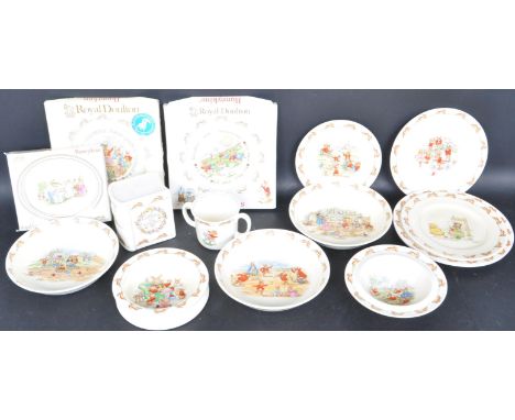 An assortment of vintage 20th century Royal Doulton Bunnykins china tableware. The collection to include cereal bowls, side p