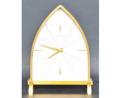 A vintage retro mid 20th century Jaeger Le-Coultre model 381 brass 8 day mantle clock. The clock having Barton numerals to th